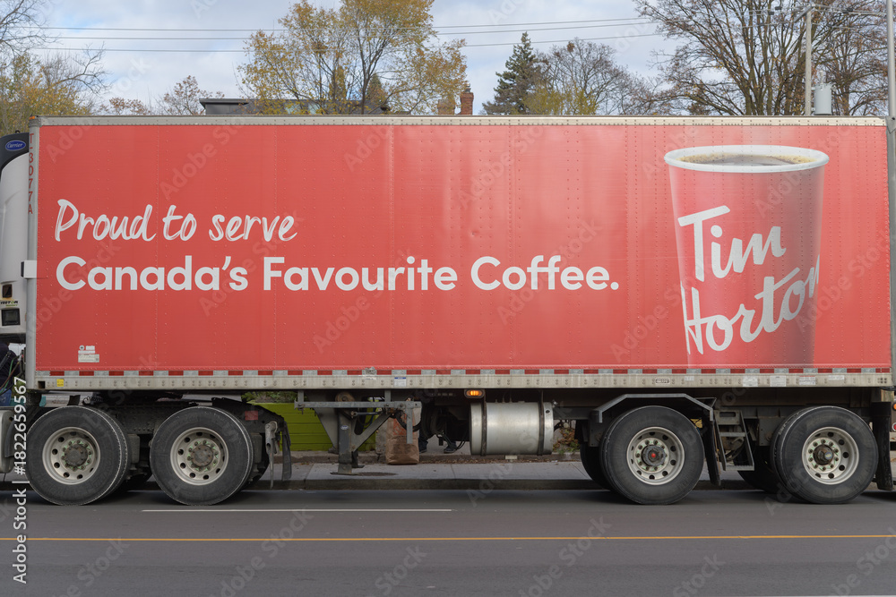 Fototapeta premium Tim Hortons delivery truck on Eglinton Av W, Toronto