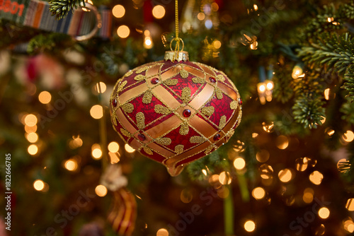 Elegant red and gold christmas ornament adds festive charm to your holiday tree decor