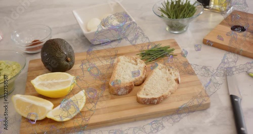 Counter scene camera starting pan, ingredients shifting, loaf slicing, staging avocado egg toast
