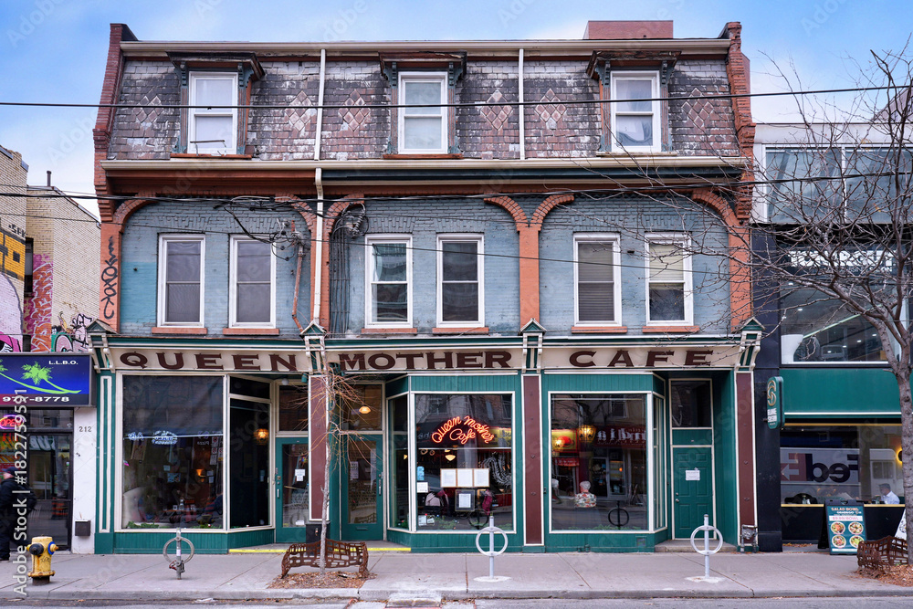 Obraz premium Building from 1850 with restaurants in the trendy west Queen Street area of Toronto
