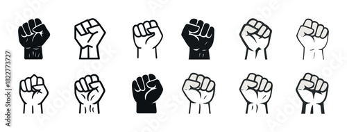 Diverse raised fists in solidarity symbols representing unity and strength across different races