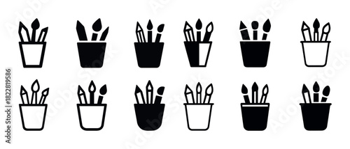 Set of black and white paintbrush icons in cups