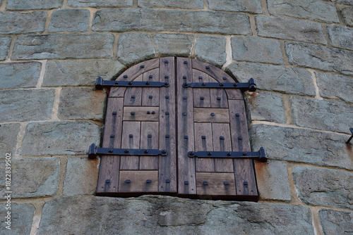 Cuadro en lienzo Martello tower window shutter. Medieval style window shutter.