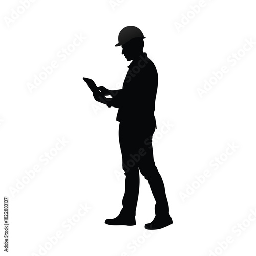 Silhouette of a construction worker using a tablet computer on a white background