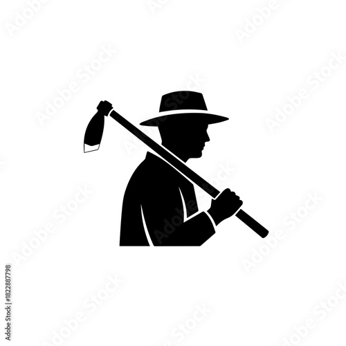 Silhouette of a Farmer with a Hoe