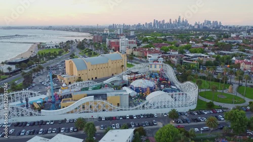 Aerial Flyover of Luna Park, Palais Theatre and Melbourne CBD Coastline