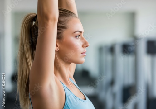 Free Download Determined young woman with blonde ponytail focused on fitness workout - GFXLoad