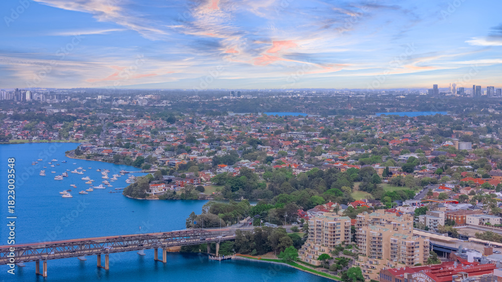 Fototapeta premium Aerial Panorama Drone view of Parramatta River Sydney Harbour between Balmain Gladesville Birkin Head Point and Roselle on the Bay Run Sydney NSW Australia