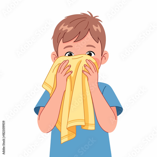 Young boy covering his face with a yellow cloth to prevent germs.