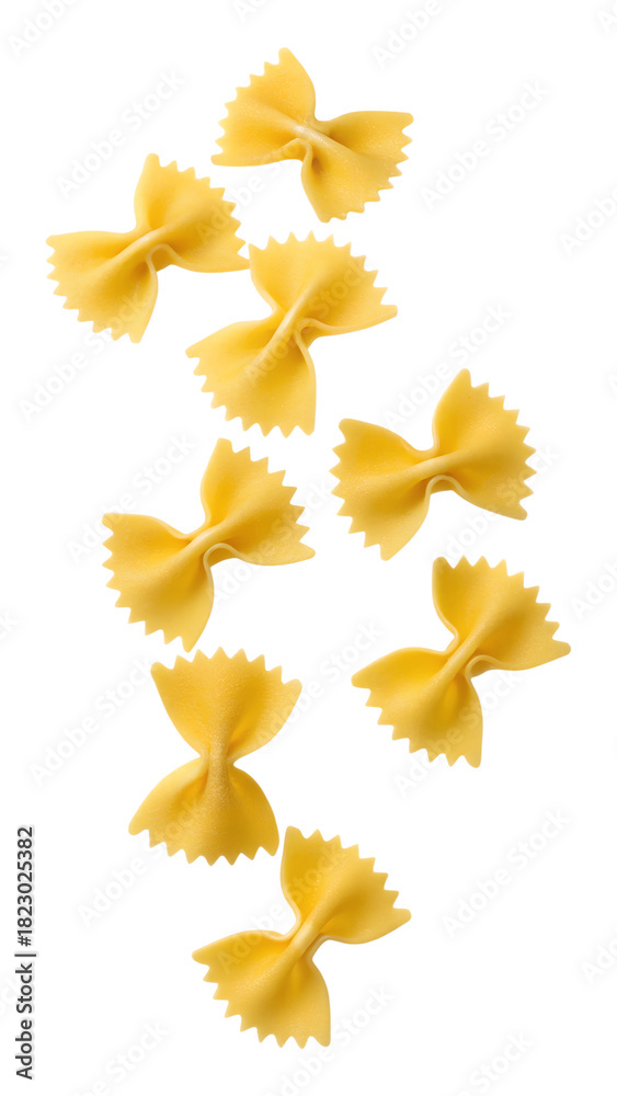 Obraz premium Falling dry bow tie pasta pieces on transparent background