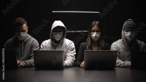Wallpaper Mural Faceless Hackers Gather in a Dark, Underground Setting to Collaborate on Cybercrime Activities With Laptops Torontodigital.ca