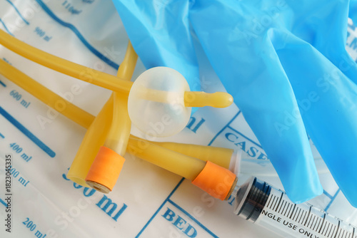 Foley catheter and urine drainage bag collect urine for disability or patient in hospital.