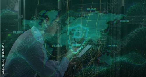 Inspecting Korean IT tech wearing light shirt tie checking tablet in data center with patch cables