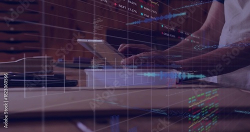 Wallpaper Mural Tapping adult male in light shortsleeve shirt at desk, showing tablet, white box and charts overlay Torontodigital.ca