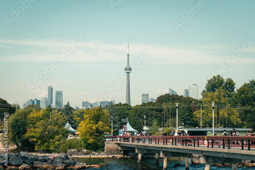 Photography View of the city skyline from a bridge, featuring the iconic tower
