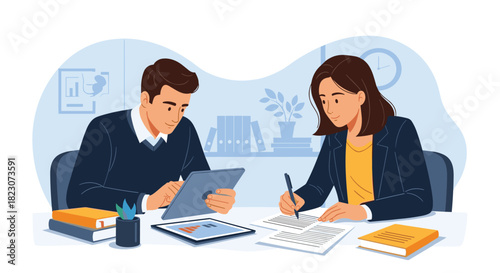 Two colleagues working together at a desk in an office, with the man using a tablet and the woman writing on paper.