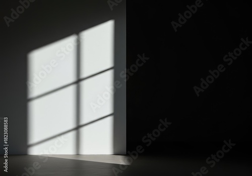 A minimalist composition featuring stark white walls and a dramatic, off-center dark shadow creating visual tension and imbalance ,quiet ,negative space ,form