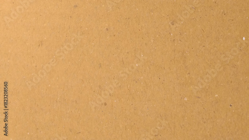 Pastel peach illumination, grainy color gradient background, Beige background subtly highlights a textured grain.