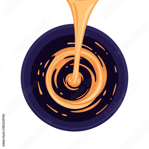 A rich golden-orange viscous liquid, possibly honey or caramel, is gracefully poured into a dark blue bowl, creating an elegant swirling pattern on its surface.