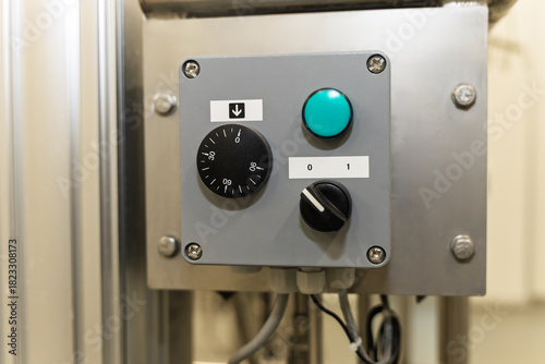 industrial control panel, rotary switch, a selector switch, and a push button used to monitor and control industrial devices motors, pumps, heaters, in an abattoir