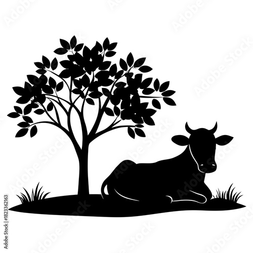 Black silhouette of a cow resting under a leafy tree silhouette