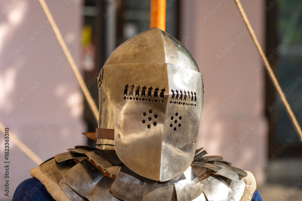 Obraz premium old medieval bascinet-type helmet popular in medieval Europe, evolving from a simple steel cap in the late 13th century