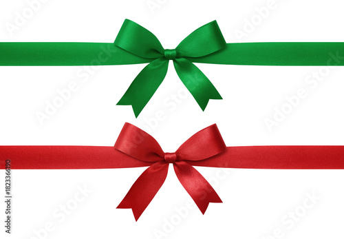 Two satin ribbons, one green and one red, tied into elegant bows on a white background.