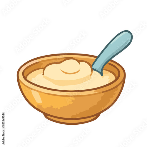 Small bowl with baby porridge or puree and a spoon
