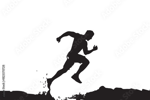 Silhouette of a muscular shirtless man quickly sprints over rugged terrain during a race
