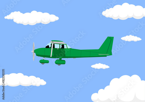 空を飛ぶプロペラ飛行機