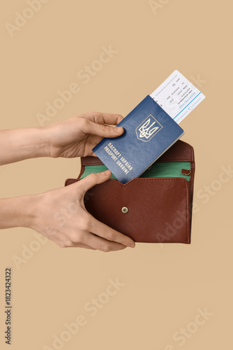 Woman putting Ukrainian pas...