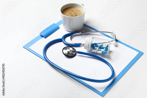 Stethoscope, clipboard, cof...