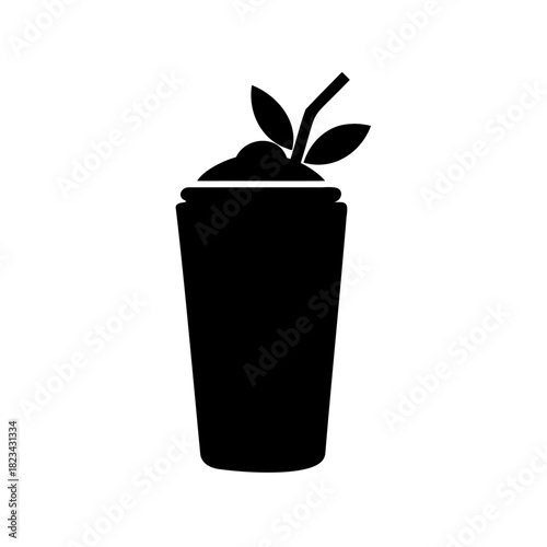 Silhouette of refreshing herbal beverage in a glass with a straw