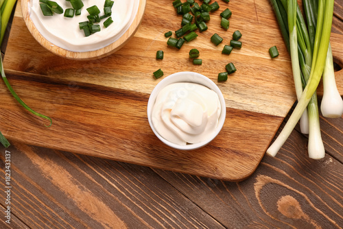 Fresh green onions and crea...