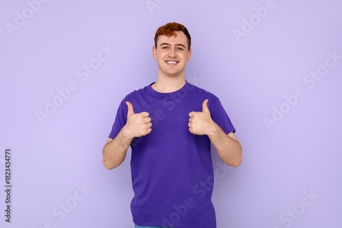Young man in purple t-shirt...