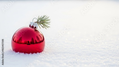hristmas ornament on white snowy background