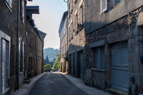 Fototapeta Naklejka Na Ścianę i Meble -  Walking in Uzerche, historical fortified royal patronage medieval town in Correse department, Nouvelle-Aquitaine, France, old houses and narrow streets
