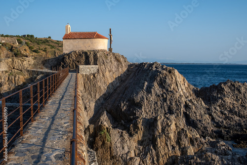 Fototapeta Naklejka Na Ścianę i Meble -  View of colourful Collioure, narrow streets and yellow, pink, orange houses, summer vacation destination town with historical buidings and beaches, Pyrenees-Orientales, France