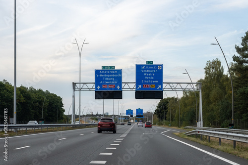 Road transportation in the Netherlands, Dutch highways, road signes, directions, driving car on multi line road, traffic jam in rush hours