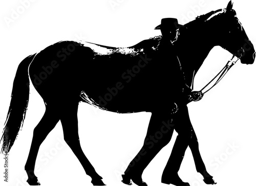 Dramatic silhouette of a horse and rider walking together in harmonious unity