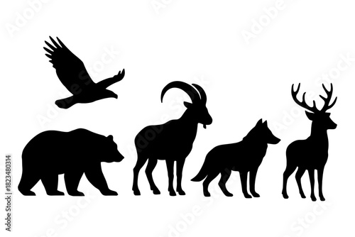 Silhouette of various wild animals including bear, goat, wolf, deer, eagle.