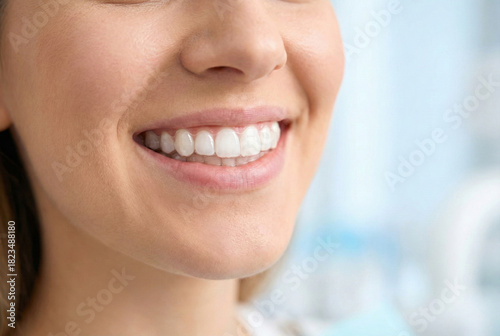 Close up of smiling young woman wearing clear orthodontic aligners