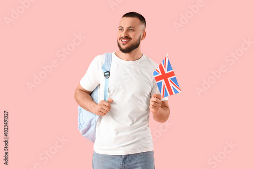 Young happy man with backpa...
