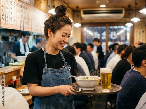 Portrait of casual Asian female staff working at ramen restaurants and pubs.
