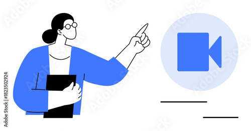 Woman holding a folder and pointing to a video icon, emphasizing virtual communication or video creation. Ideal for content planning, online education, training, remote work, tutorials, branding