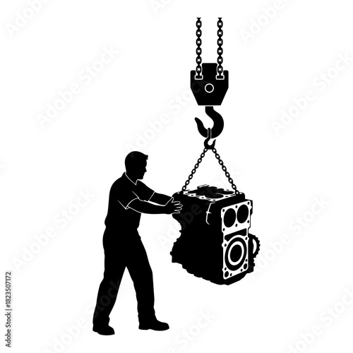 Man moves heavy industrial engine suspended by crane hook, powerful machinery concept