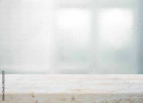 White wood kitchen island with blur window wall