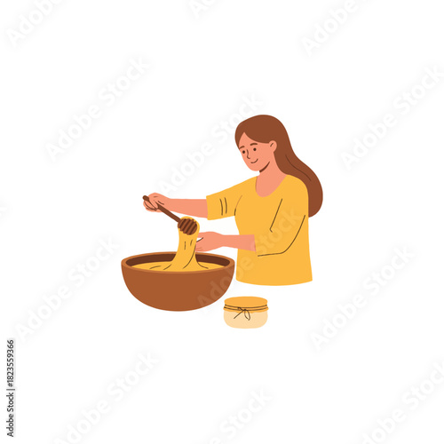 Young woman stirring a bowl of golden honey with a wooden spoon preparing natural skincare