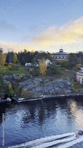 Baltic coast in autumn near Stockholm with colorful foliage, rural houses, and wide ocean views, Nordic travel footage.