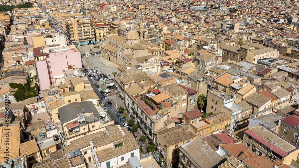 Fototapeta premium Aerial view of the mother church of Gela, located in the province of Caltanissetta, Sicily, Italy. It is located in the historic center of the Sicilian town and is the city's main place of worship.